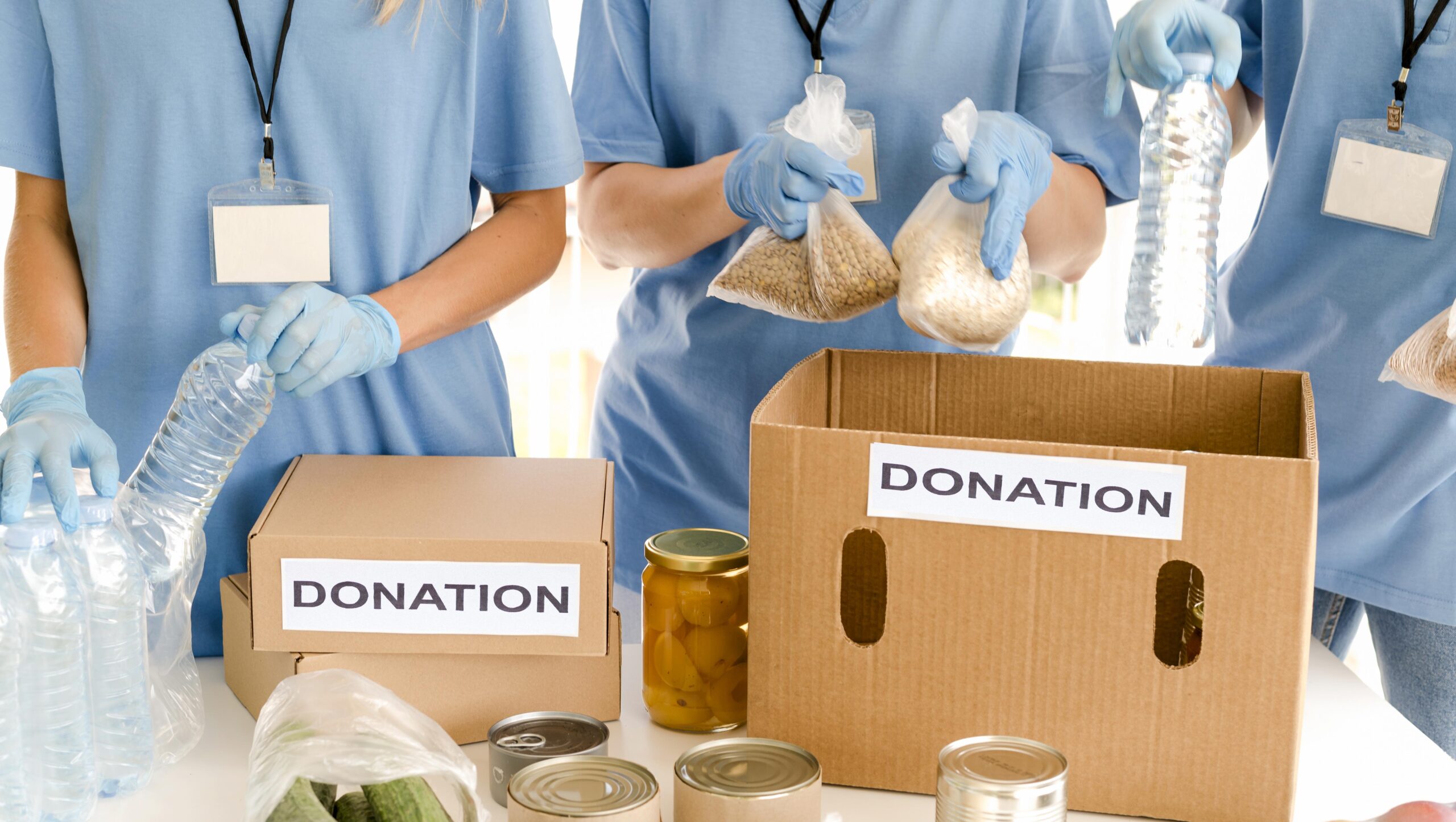 people-preparing-boxes-food-donation